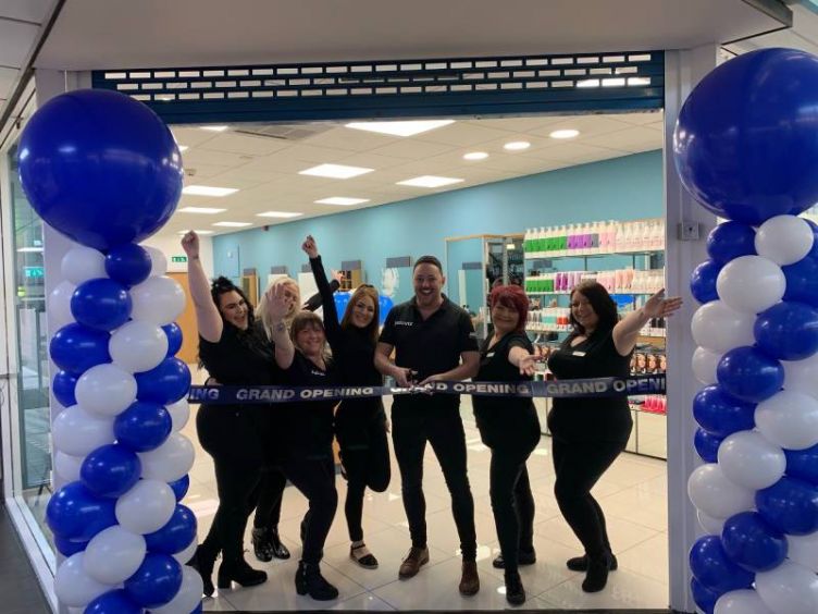 Just Cuts expands with new salon location and management promotion